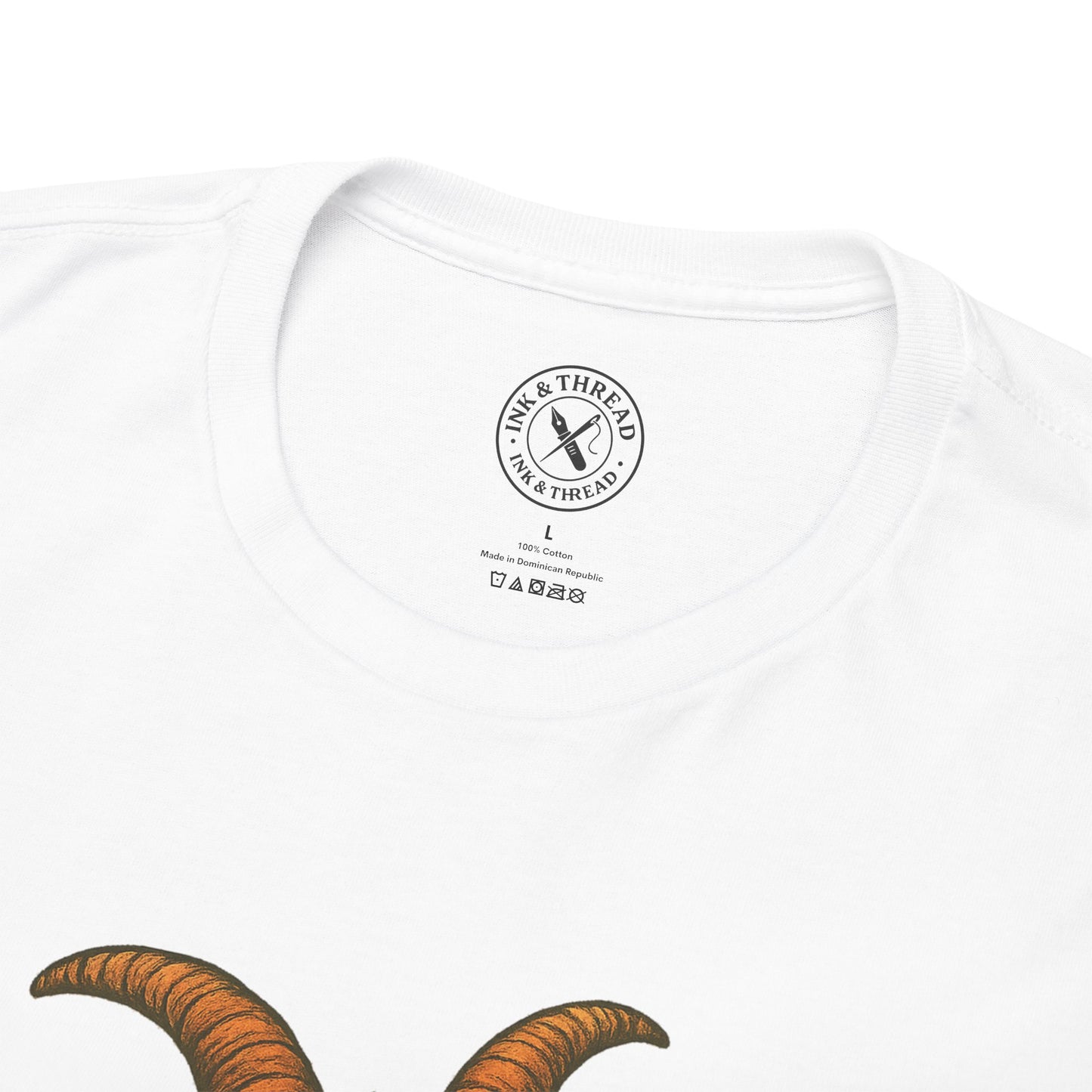 White t-shirt with a brand logo and orange horns on a white background