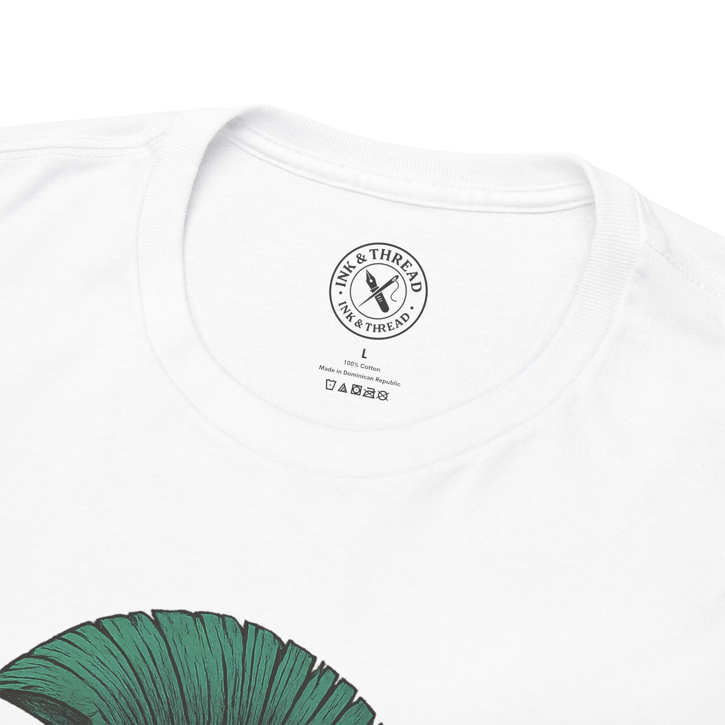 White t-shirt with a green leaf design and 'Ink & Thread' logo on a white background