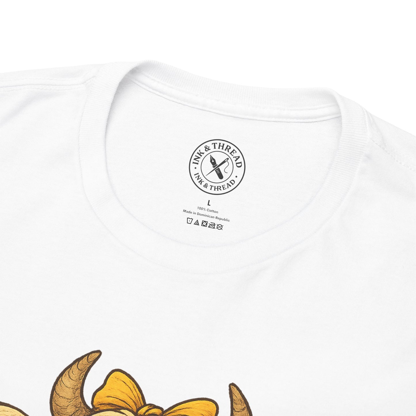 White t-shirt with a logo and text on the chest, featuring yellow animal-like creature design.
