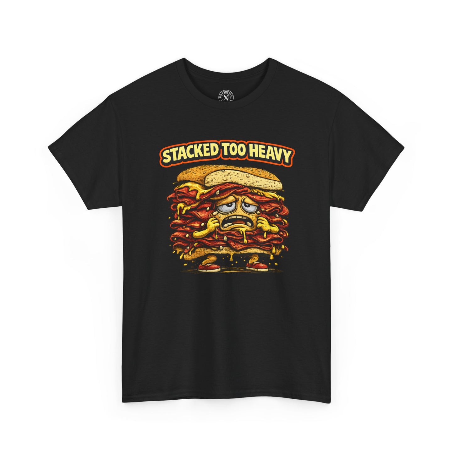 Black t-shirt with a cartoon sandwich graphic and 'Stacked Too Heavy' text on a white background