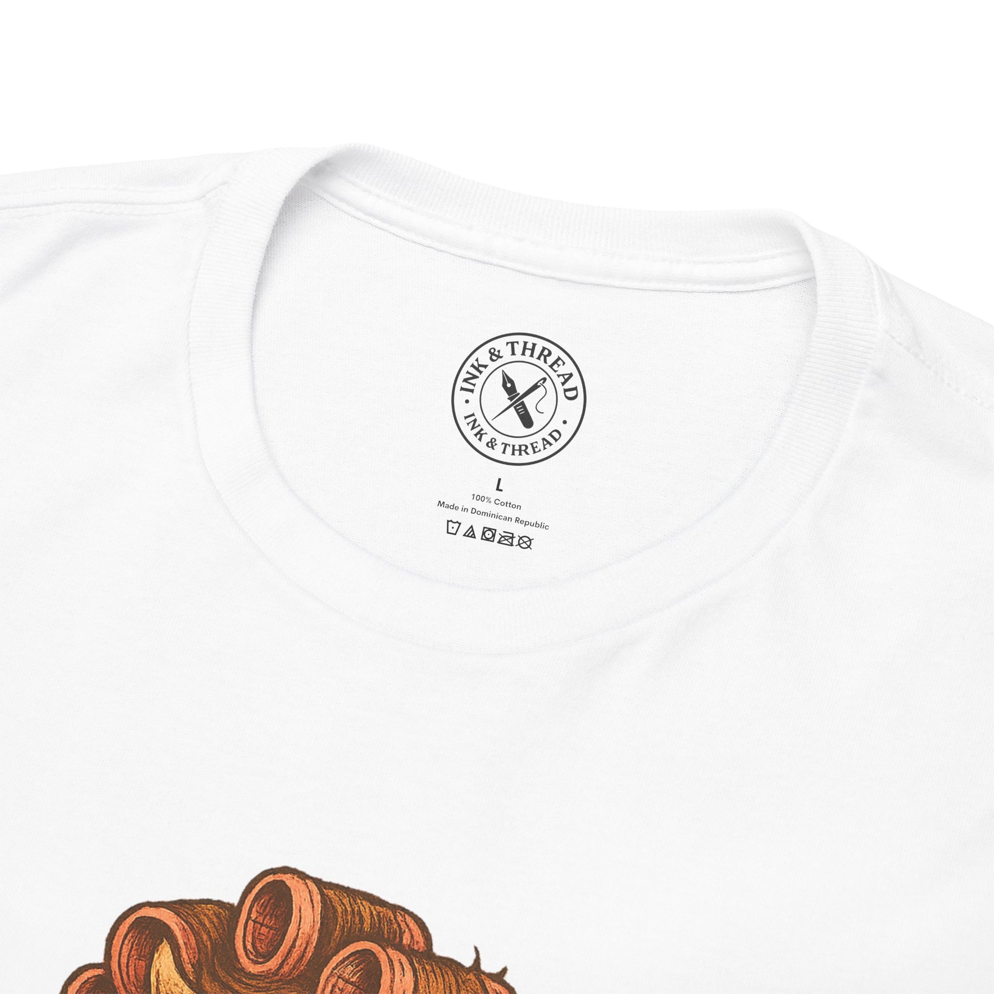White t-shirt with a logo and text on the chest, featuring the brand 'Ink & Thread'.