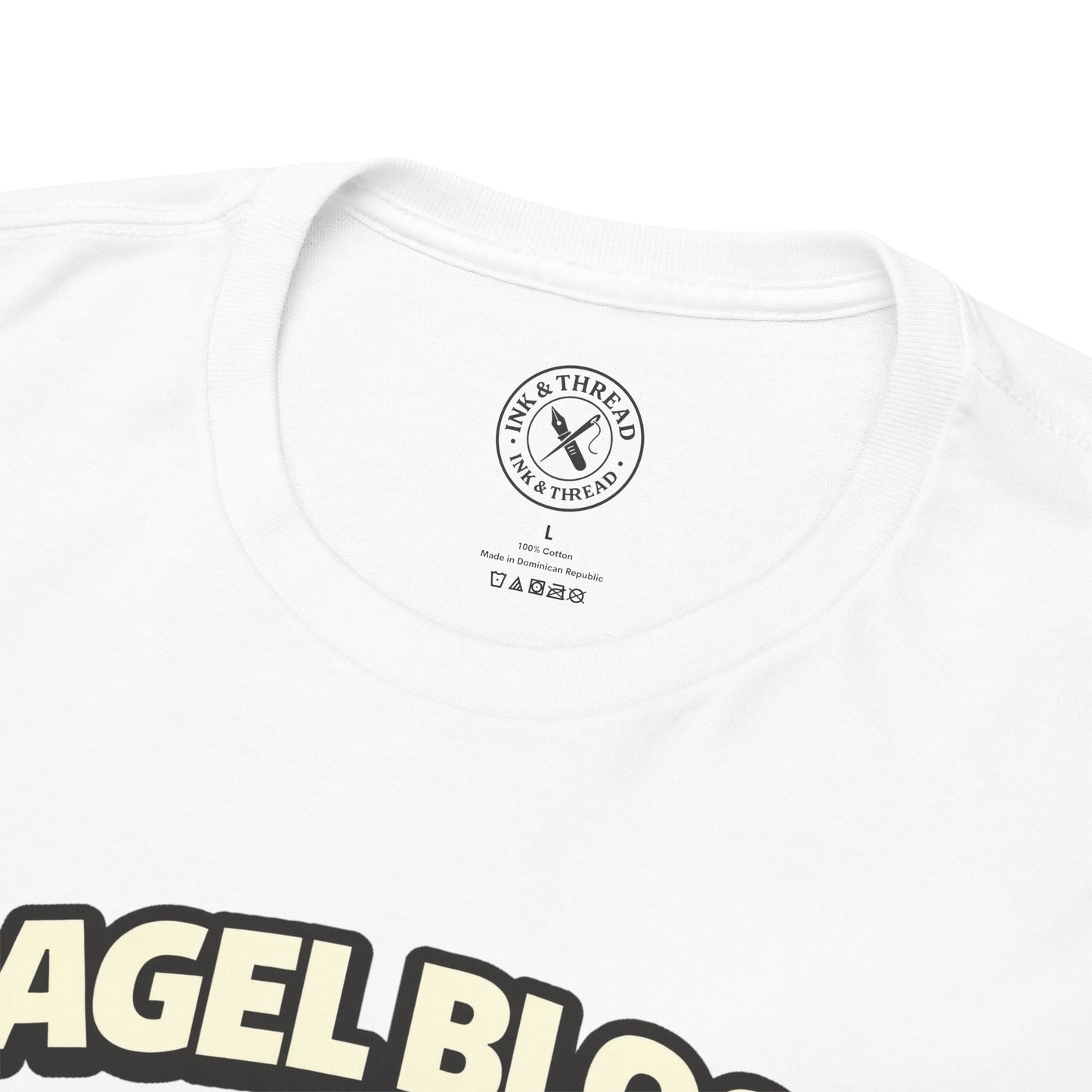 White t-shirt with 'Ink & Thread' logo and 'Bagel Blog' text on a white background