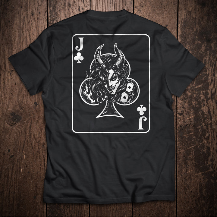 Black t-shirt with a white graphic design on a wooden surface