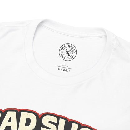 White t-shirt with a brand logo on the chest and text at the bottom.