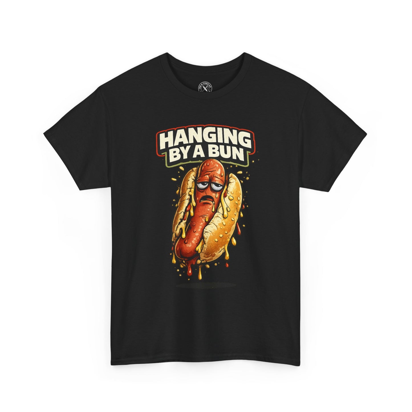 Black t-shirt with a hot dog graphic and 'Hanging By A Bun' text on a white background