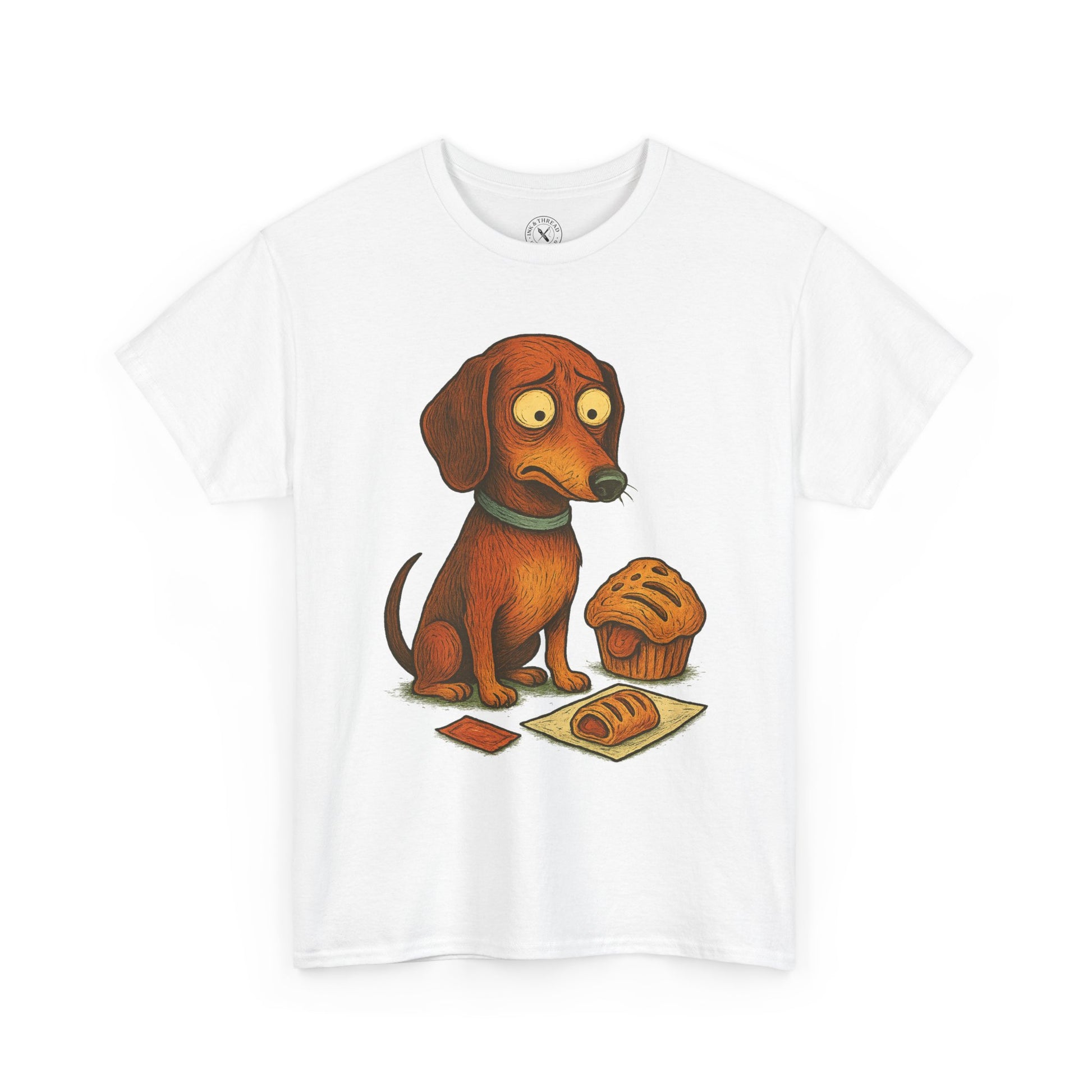 White t-shirt with a cartoon dog and muffin graphic on a white background