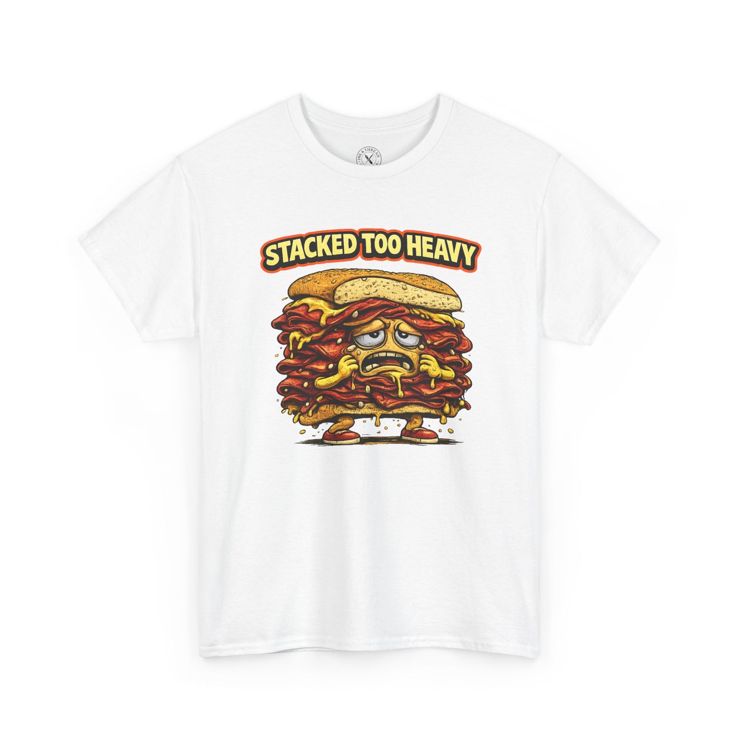 White t-shirt with a cartoon sandwich graphic and 'Stacked Too Heavy' text on a white background