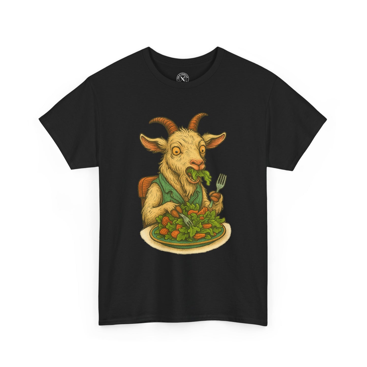 Black t-shirt with a graphic of a goat eating salad on a white background