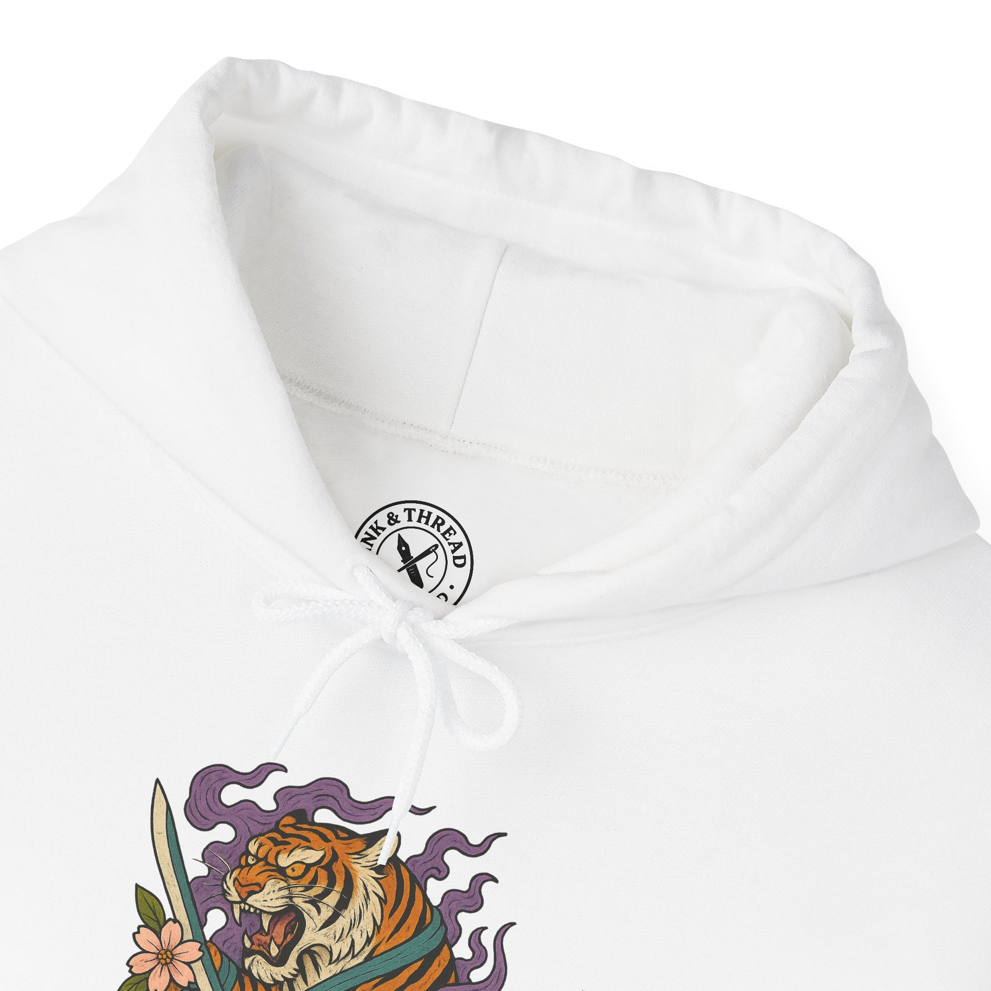 White hoodie with a tiger design and brand logo on a white background