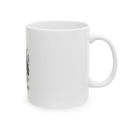 White mug with a small design on a white background