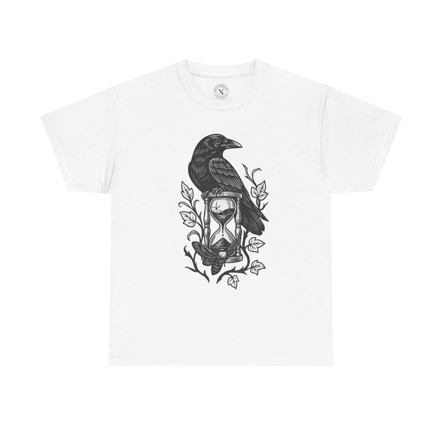 White t-shirt with a black and white design of a crow and hourglass on a white background