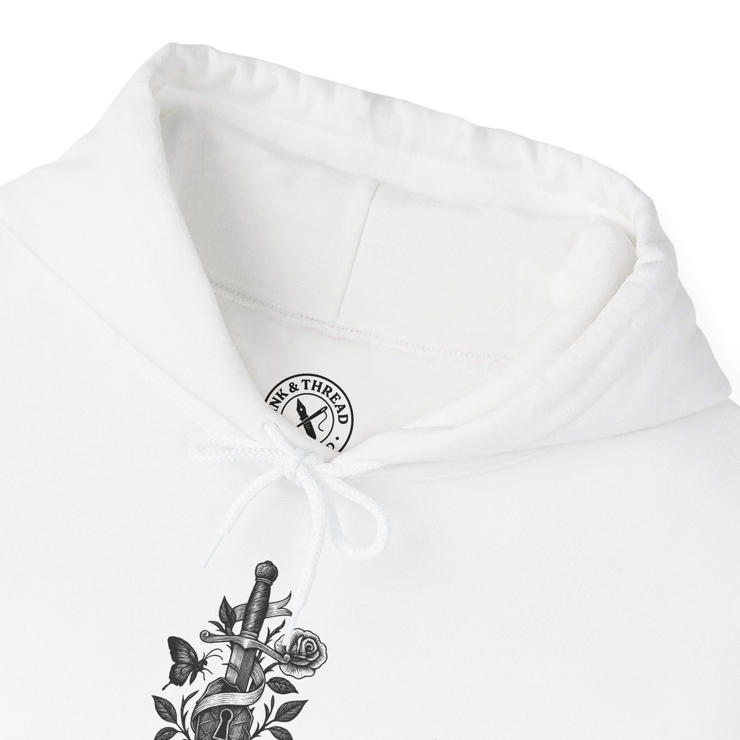 White hoodie with a brand logo on the chest and a decorative design on the sleeve.