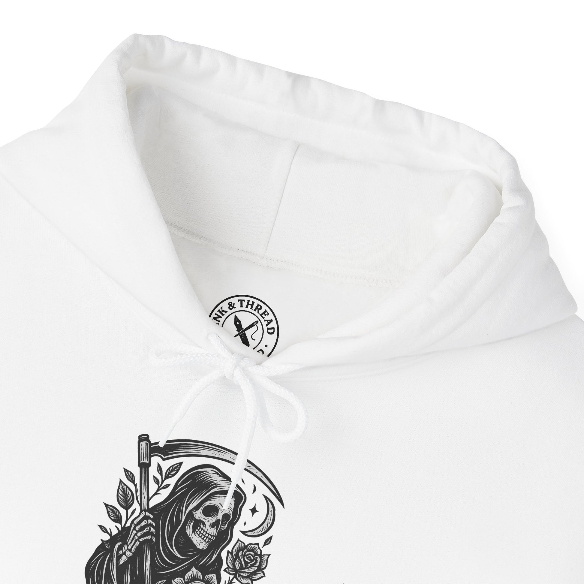 White hoodie with a graphic design of a skeleton holding an axe and roses, featuring a brand logo on the chest.