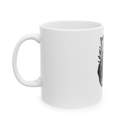 White mug with a black and white design on a white background