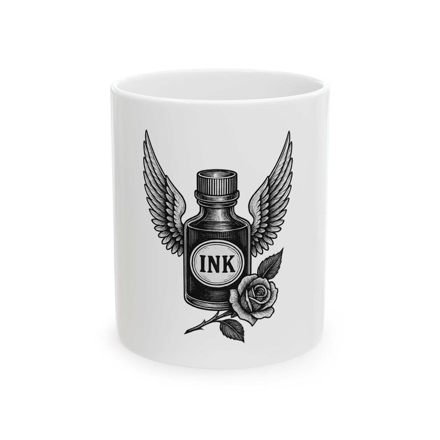 White mug with black ink bottle design featuring wings and a rose on a white background
