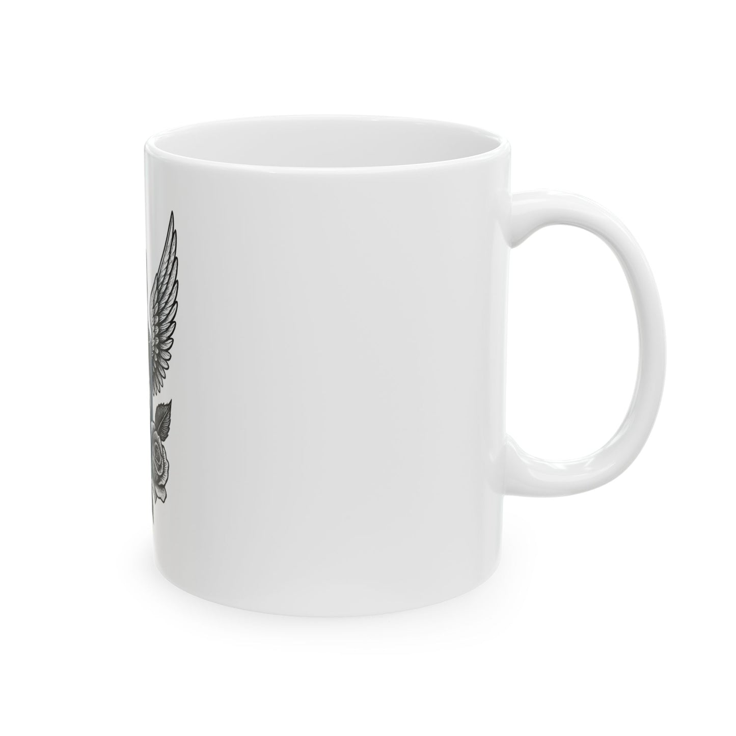 White mug with black feather design on a white background