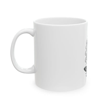White mug with a black and white design on a white background