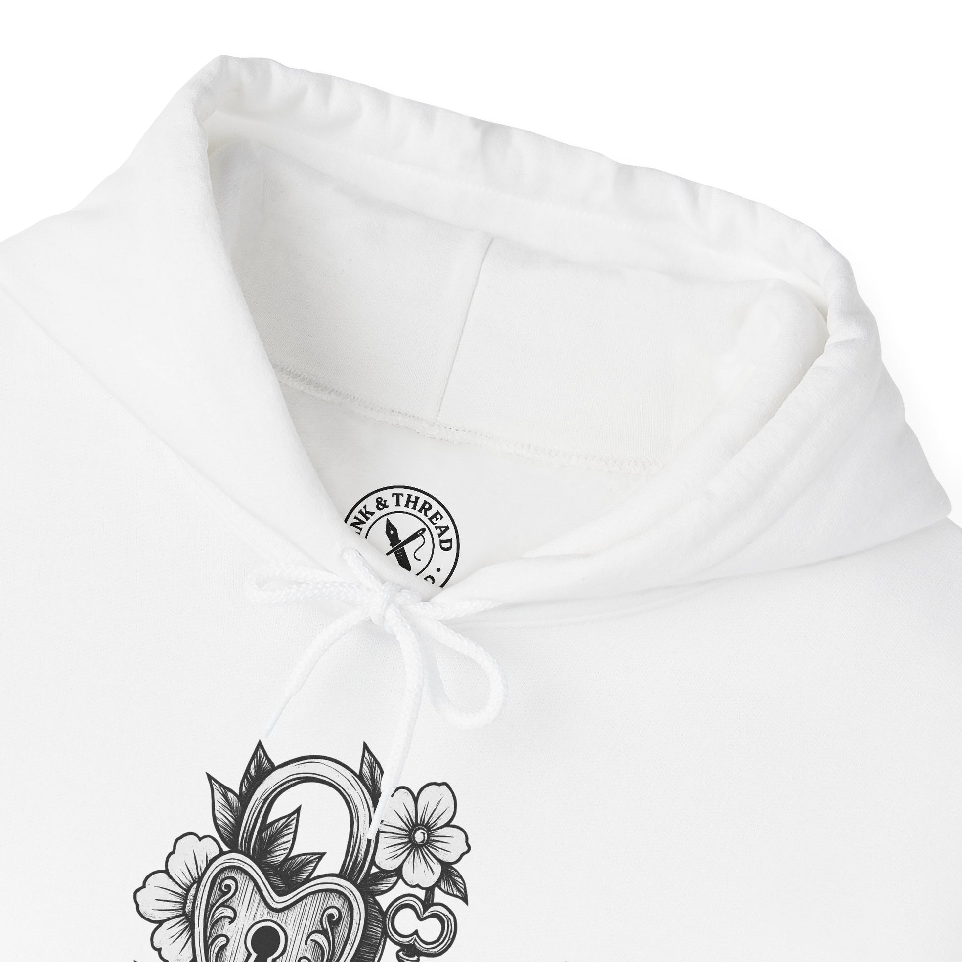 White hoodie with black floral and lock design on a white background