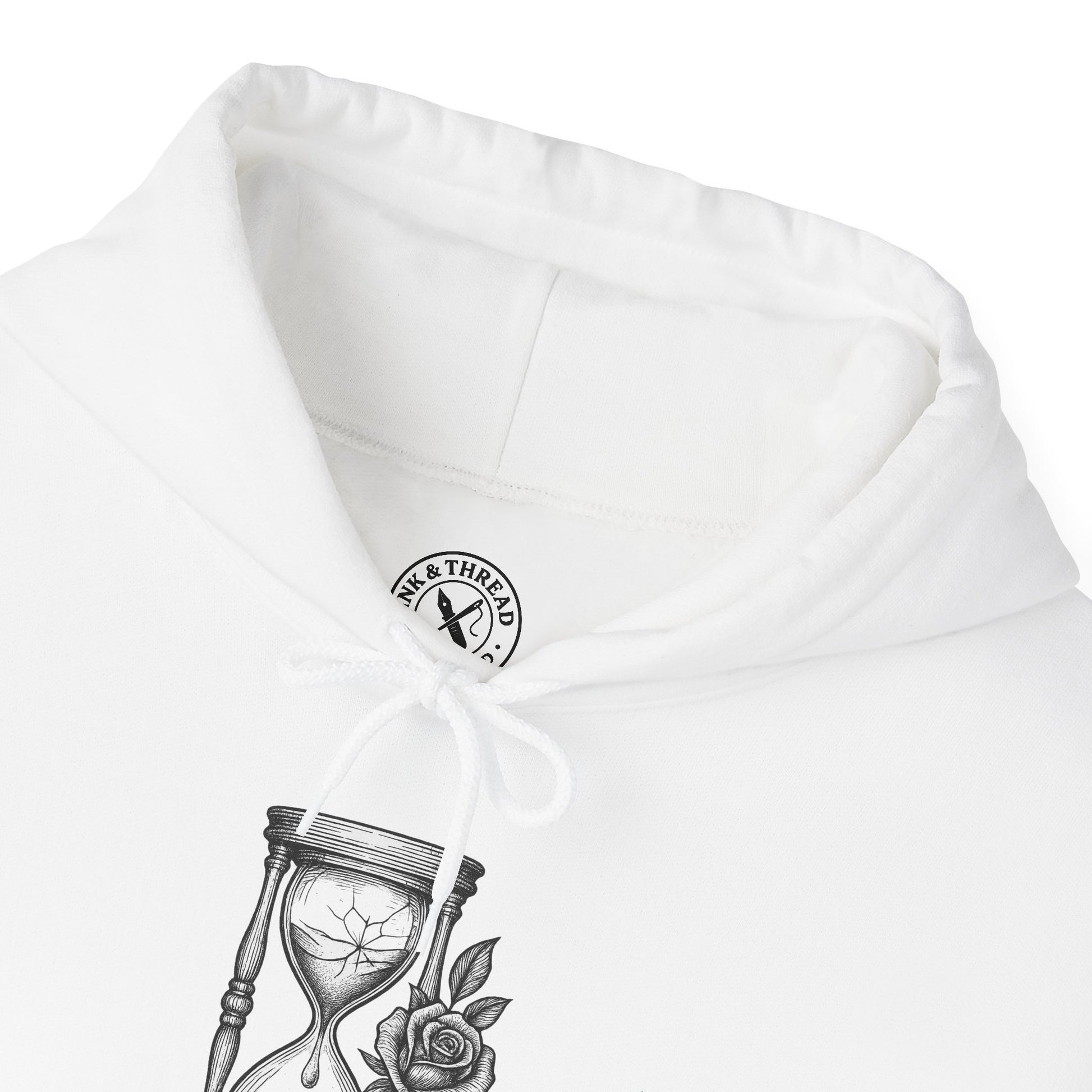 White hoodie with a brand logo and design on the chest pocket against a white background