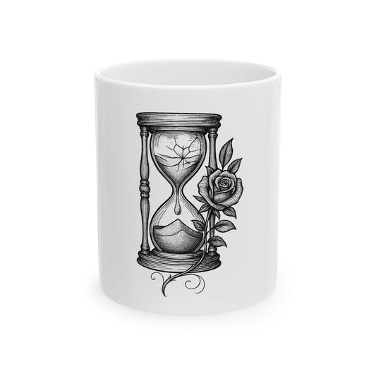 White mug with hourglass and rose design on a white background
