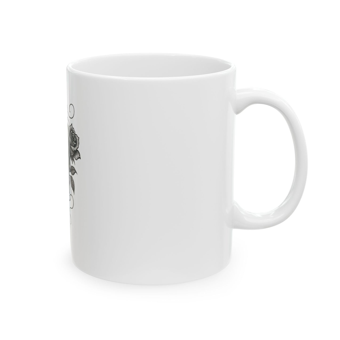 White mug with black floral design on a white background