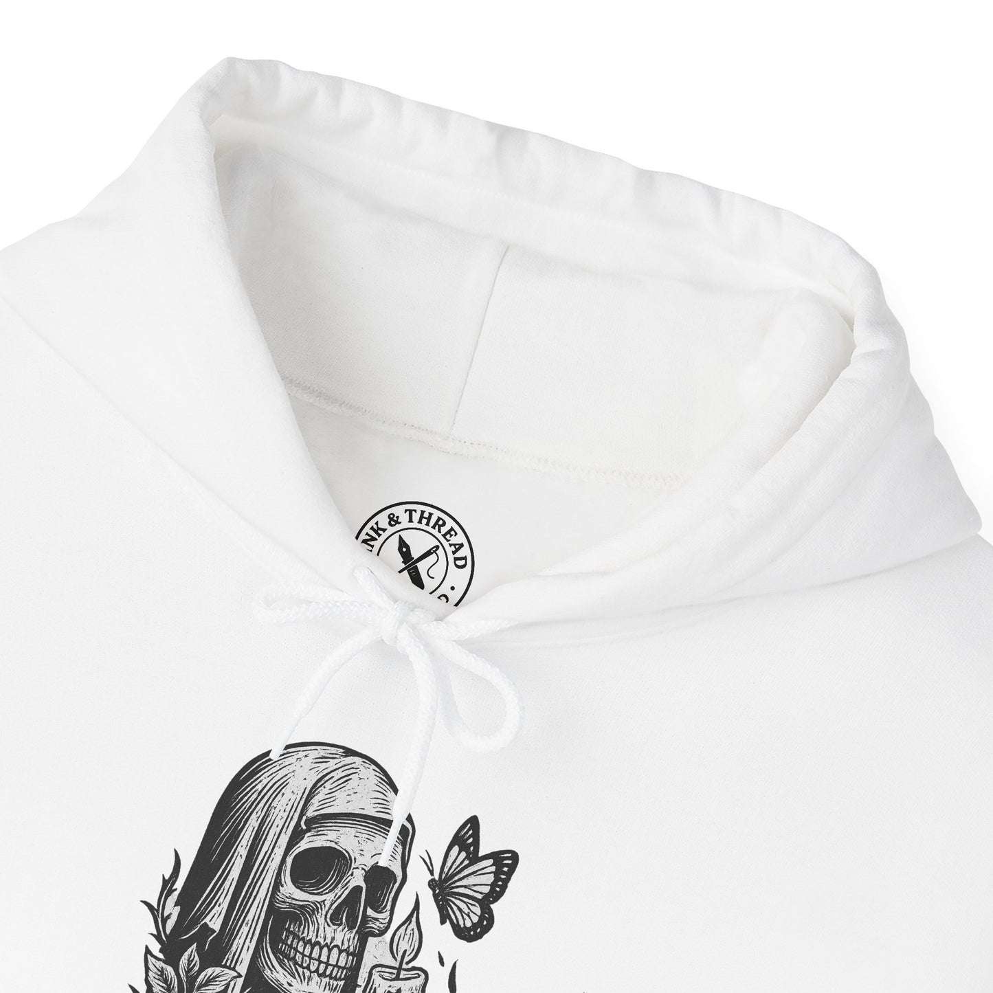 White hoodie with skull and butterfly design and 'My & Thread' logo.