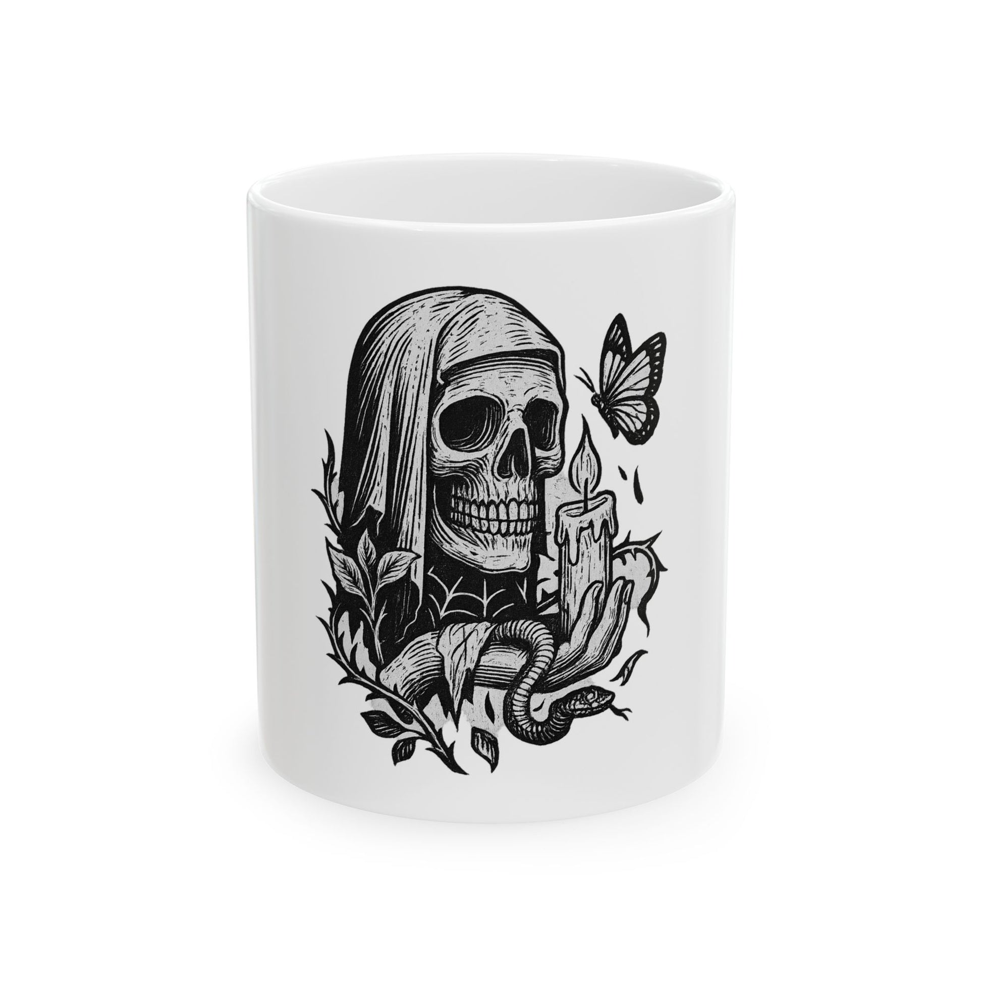 White mug with black skull and candle design on a white background