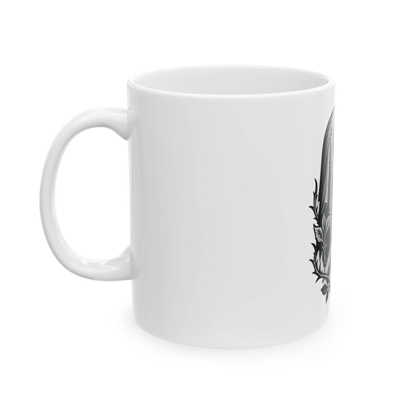 White mug with a black floral design on a white background
