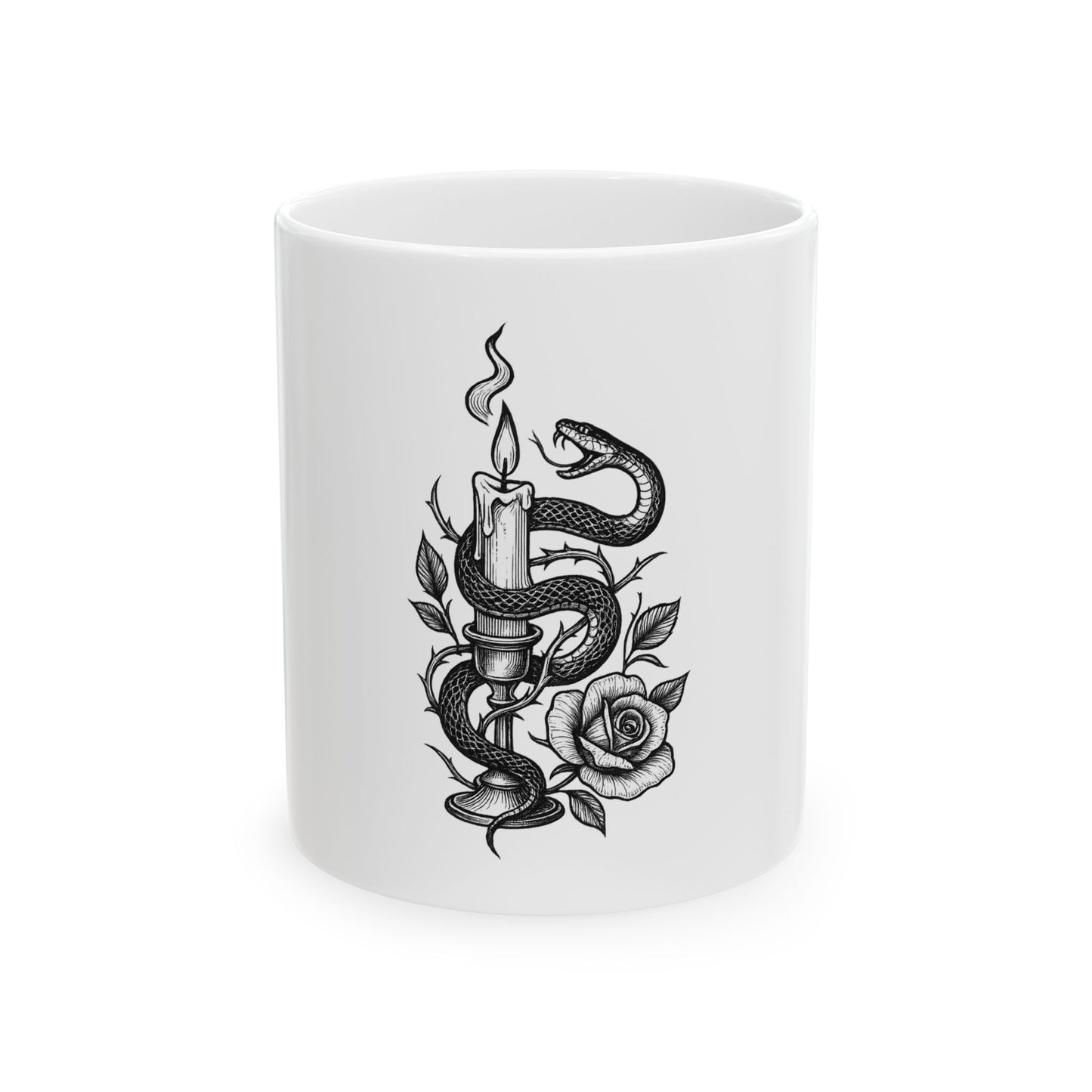 White mug with black and gray design of a candle, snake, and rose on a white background