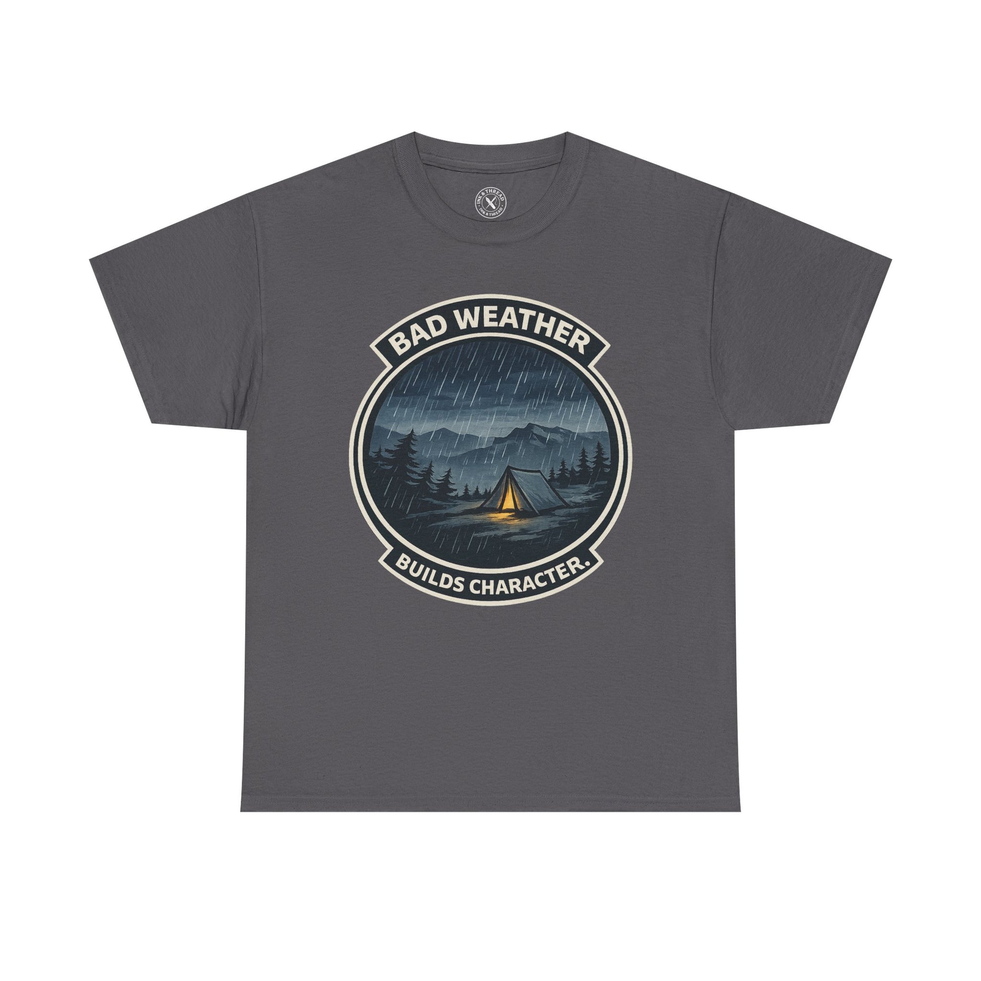 Charcoal grey unisex t-shirt featuring Bad Weather Builds Character camping badge graphic with rainy tent scene and mountain design