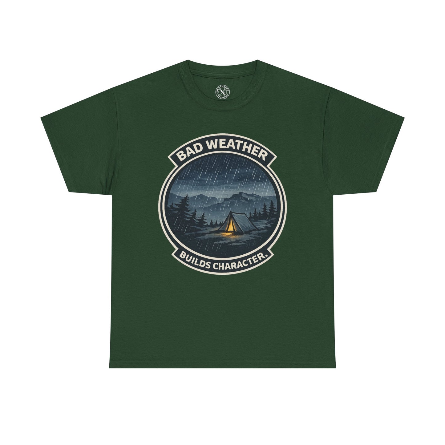 Forest green unisex t-shirt featuring Bad Weather Builds Character camping badge graphic with rainy tent scene and mountain design