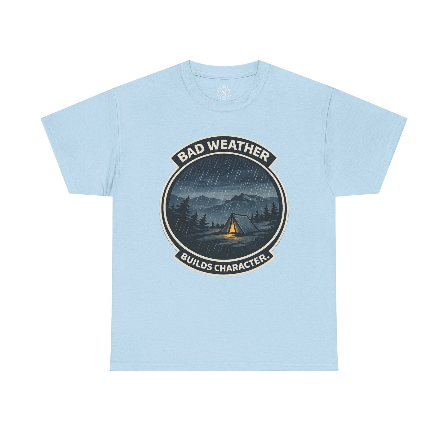 Light blue unisex t-shirt featuring Bad Weather Builds Character camping badge graphic with rainy tent scene and mountain design