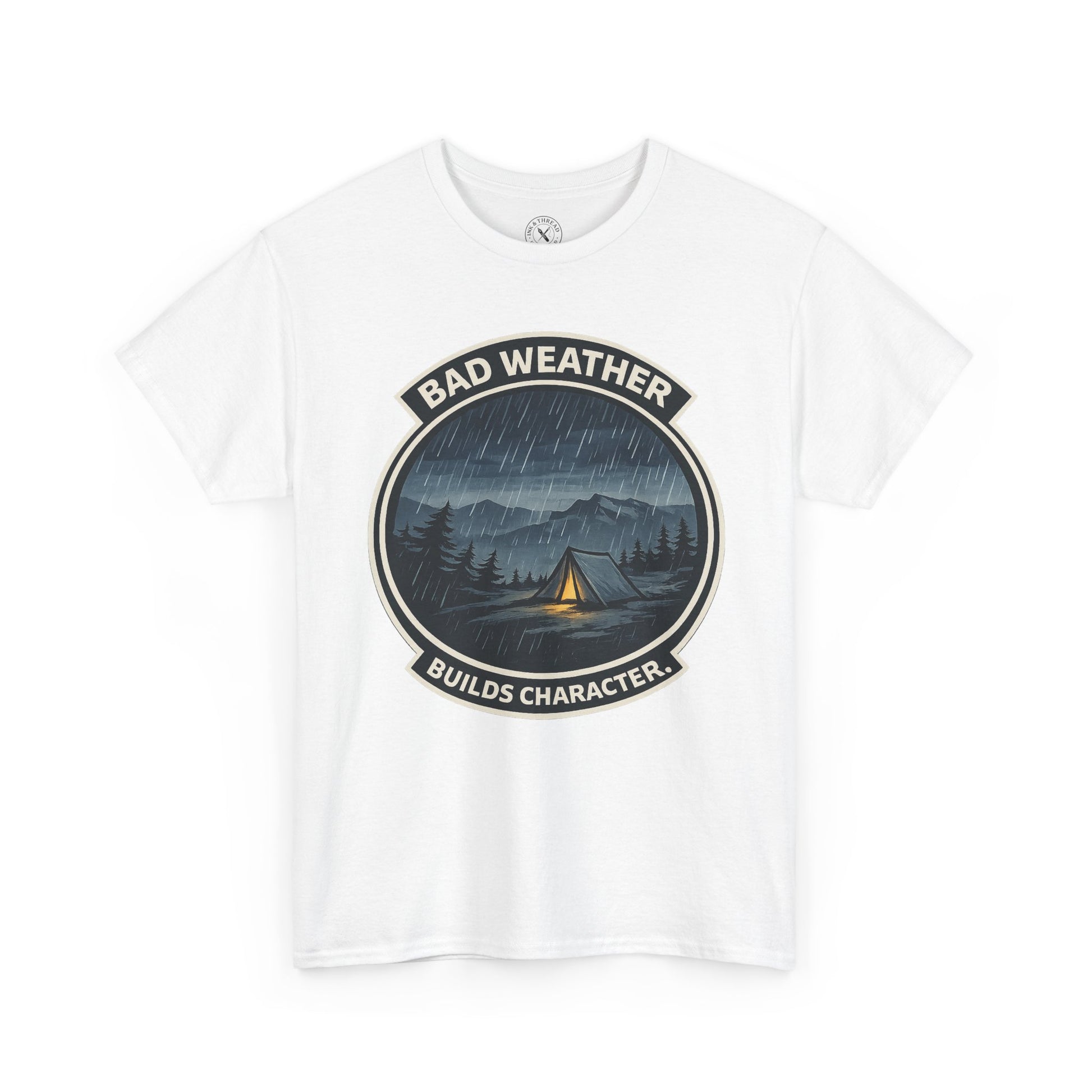 Natural white unisex t-shirt featuring Bad Weather Builds Character camping badge graphic with rainy tent scene and mountain design