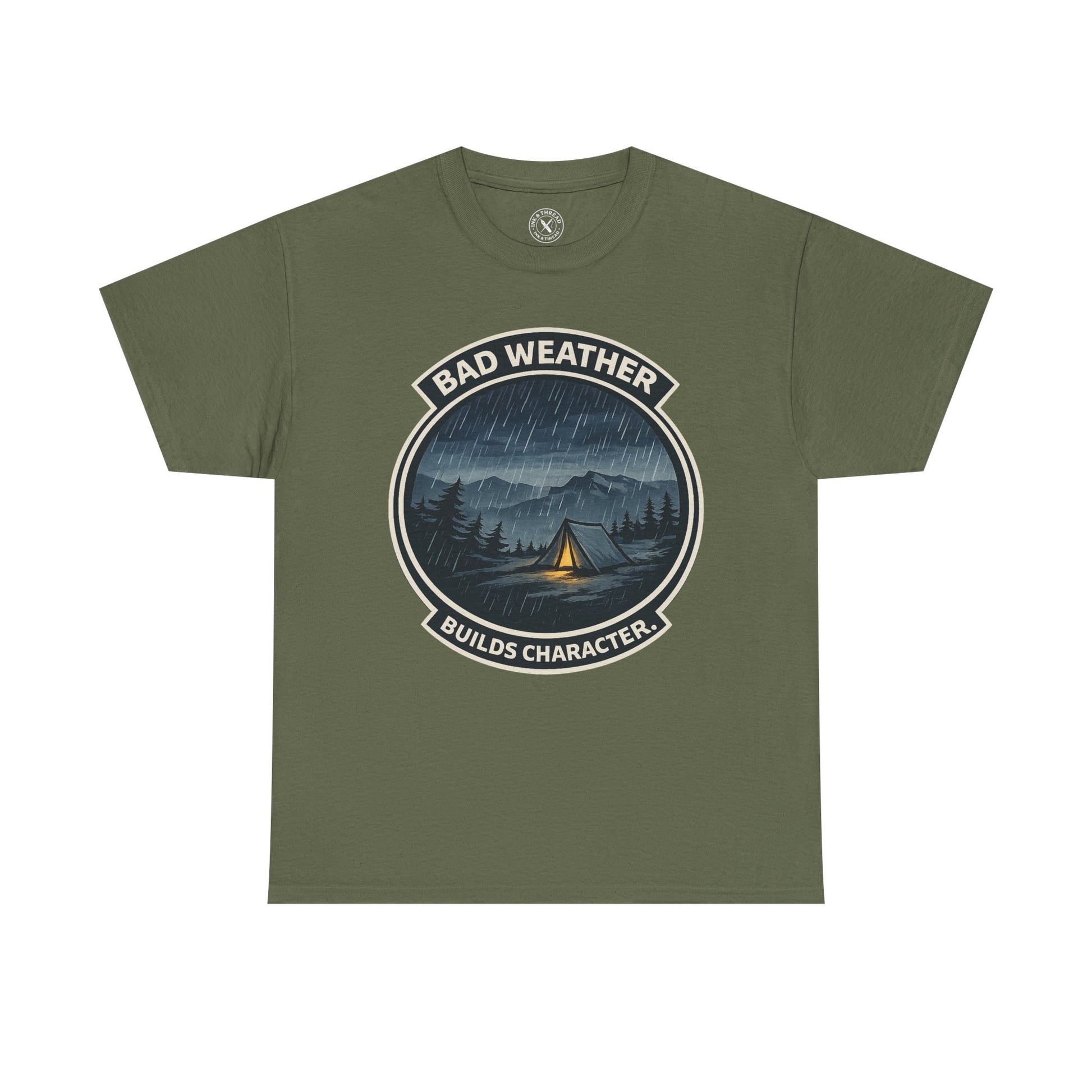 Olive green unisex t-shirt featuring Bad Weather Builds Character camping badge graphic with rainy tent scene and mountain design