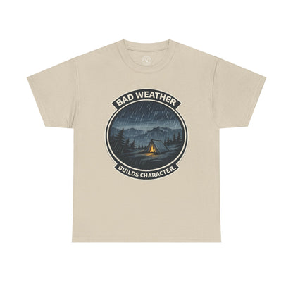 Sand beige unisex t-shirt featuring Bad Weather Builds Character camping badge graphic with rainy tent scene and mountain design
