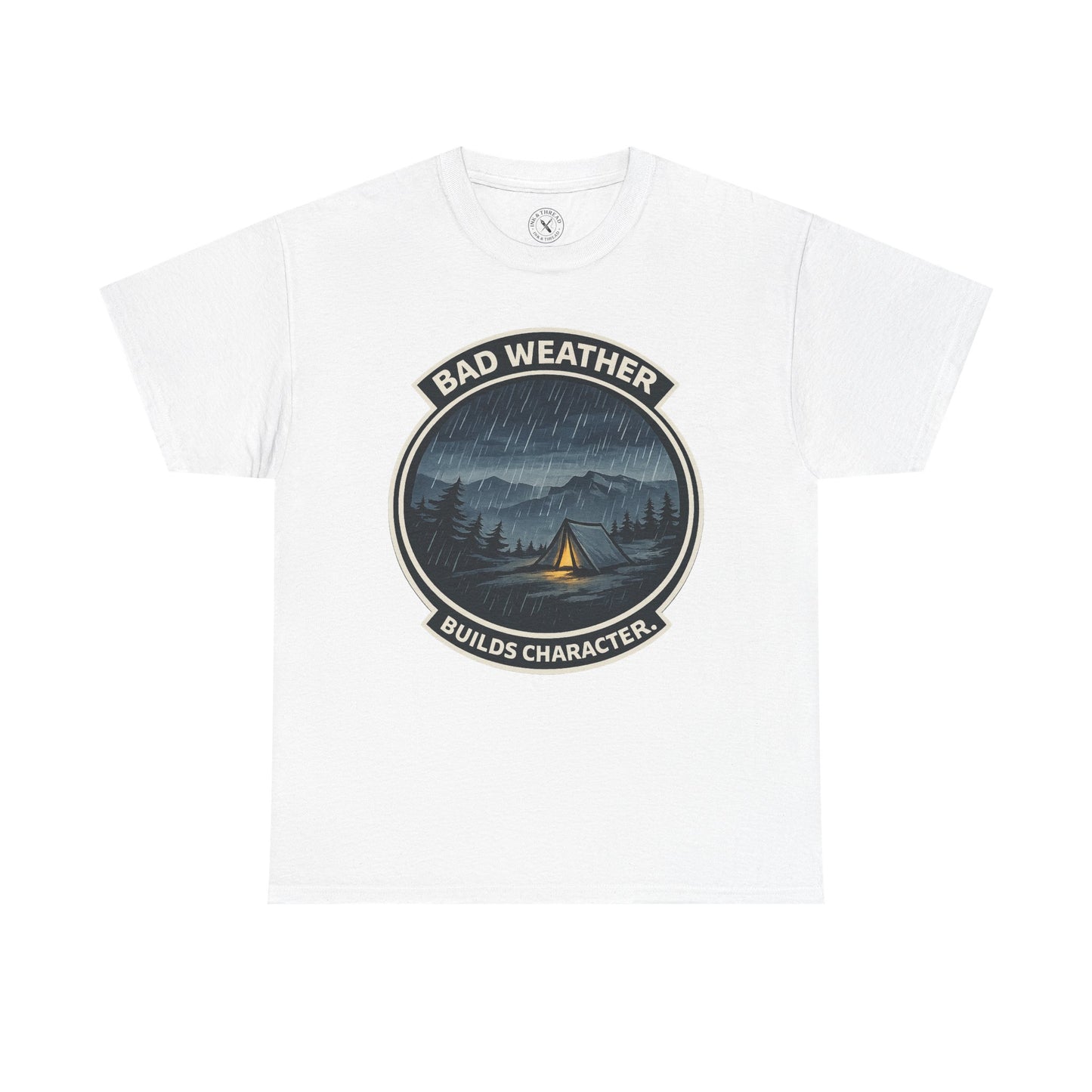 White unisex t-shirt featuring Bad Weather Builds Character camping badge graphic with rainy tent scene and mountain design