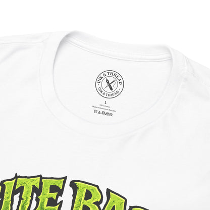 Close-up of Ink & Thread UK branded neck label on Bite Back t-shirt showing quality branding and care instructions