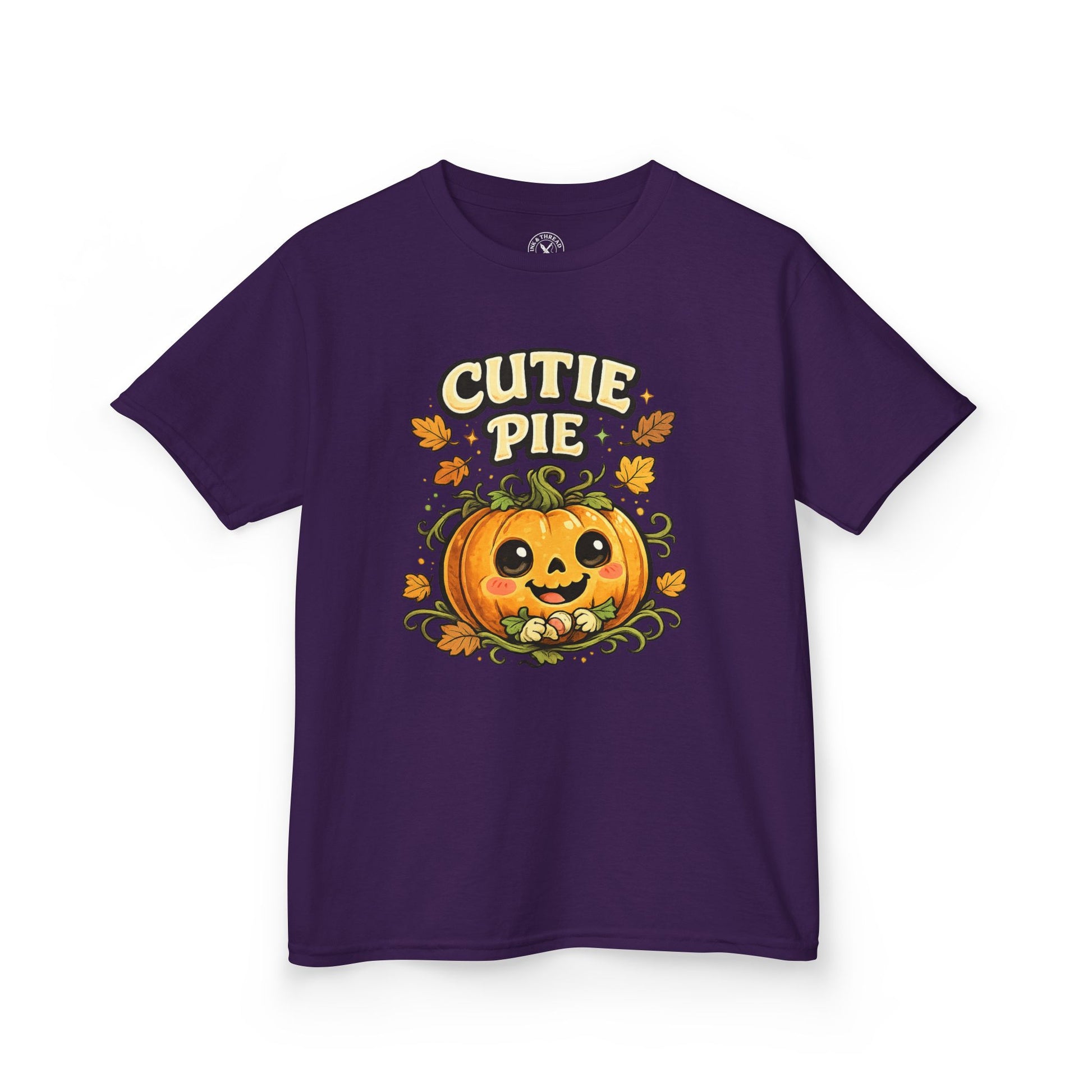 Cutie Pie purple graphic t-shirt featuring a smiling pumpkin jack-o-lantern with autumn leaves design