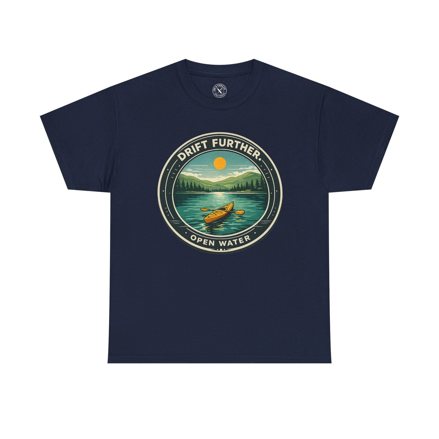 Navy blue unisex t-shirt featuring Drift Further Open Water kayaking circular badge graphic with canoe on lake and sun design