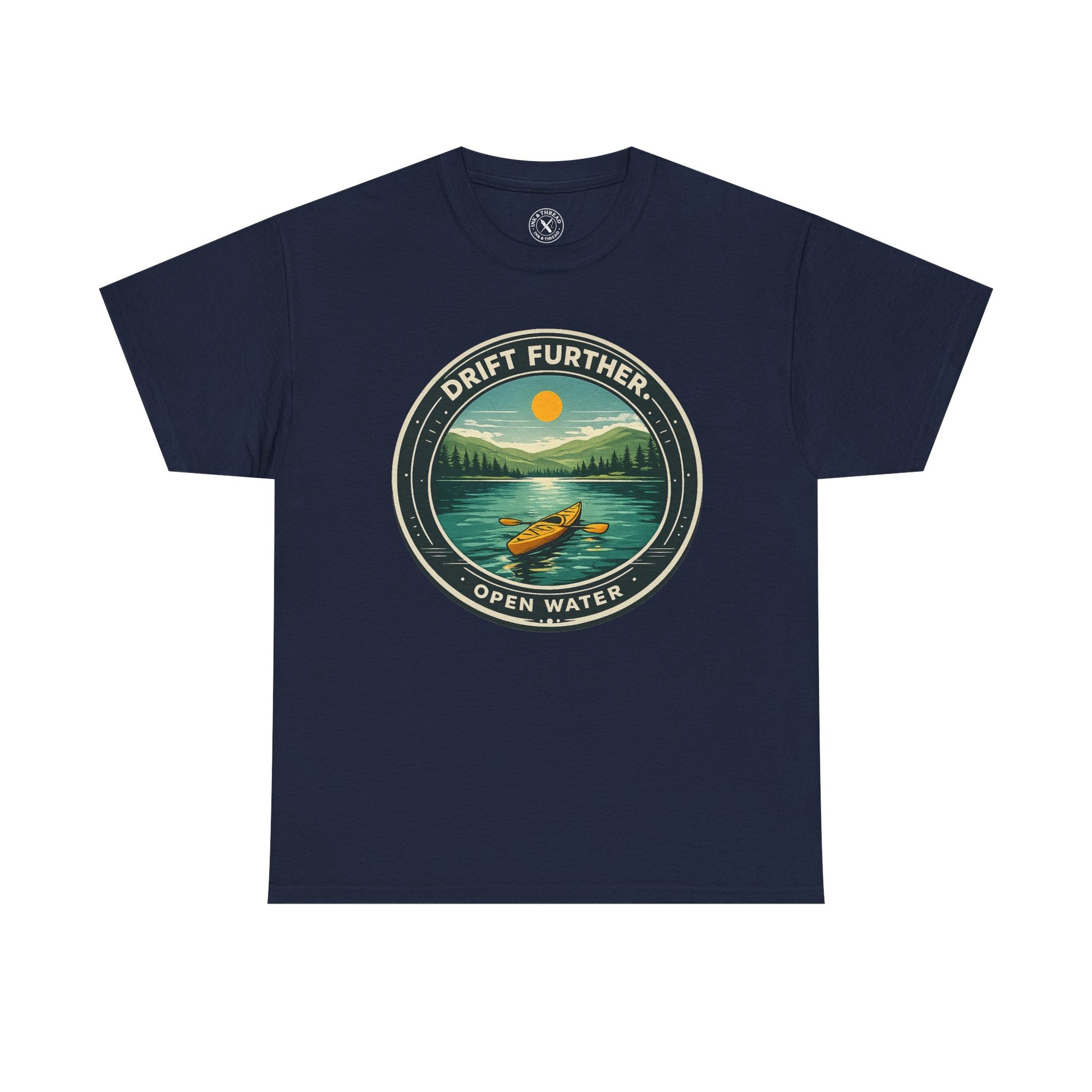 Navy blue unisex t-shirt featuring Drift Further Open Water kayaking circular badge graphic with canoe on lake and sun design