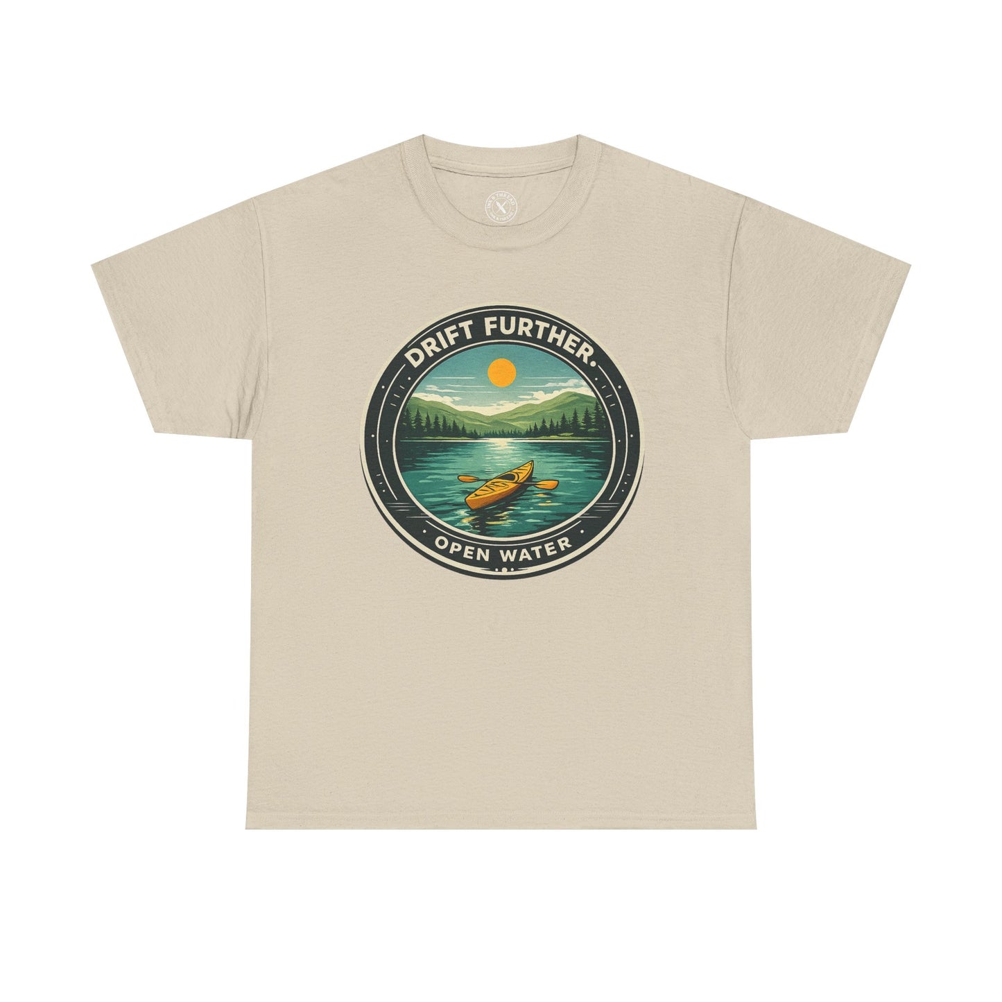 Sand beige unisex t-shirt featuring Drift Further Open Water kayaking circular badge graphic with canoe on lake and sun design