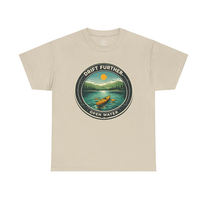 Sand beige unisex t-shirt featuring Drift Further Open Water kayaking circular badge graphic with canoe on lake and sun design