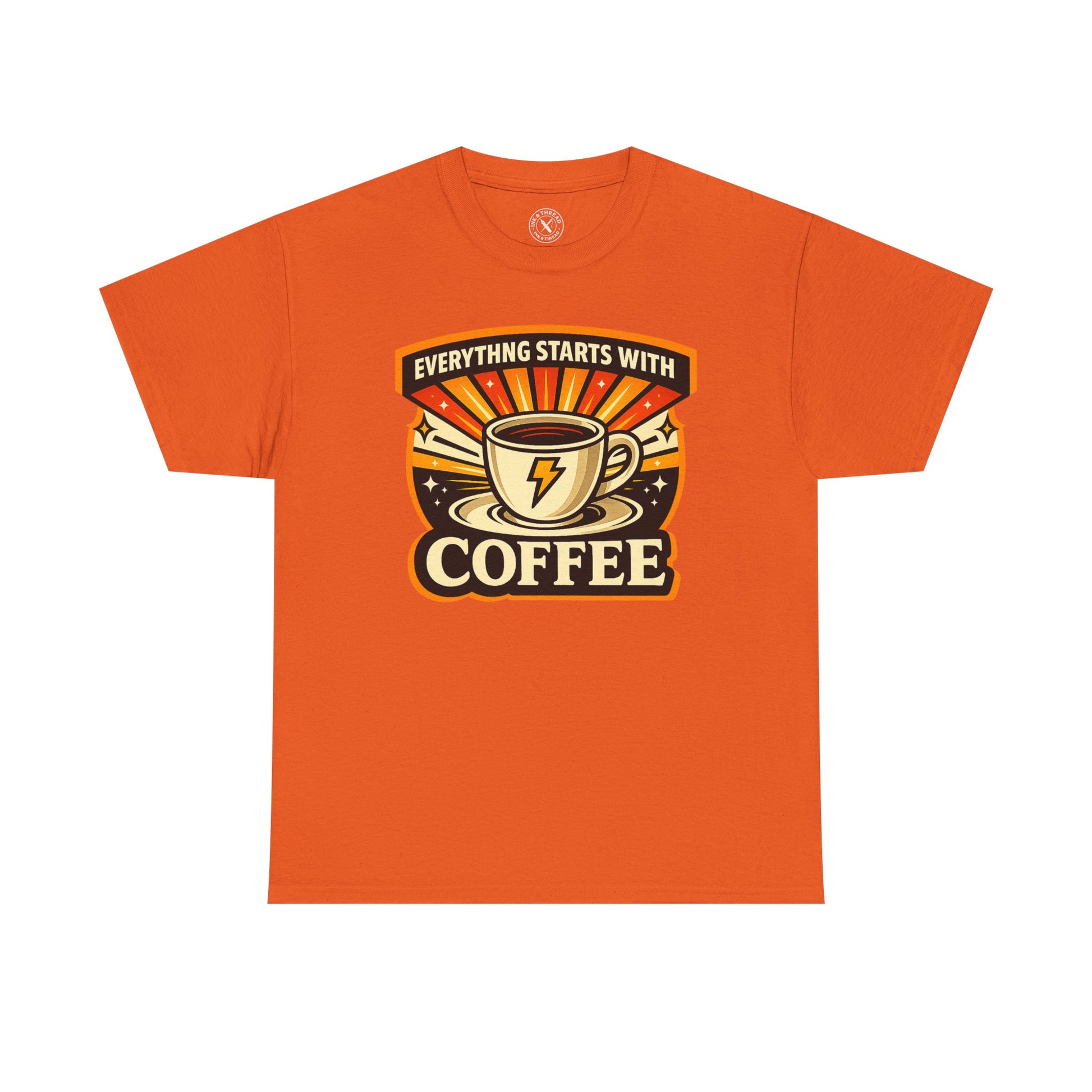 Orange t-shirt with Everything Starts With Coffee graphic design featuring a coffee cup with lightning bolt on a white background