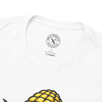 White t-shirt back label showing Ink and Thread UK brand logo and Cornfused corn graphic with care instructions tag detail