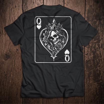 Black t-shirt flat lay on wooden surface with Queen of Hearts playing card design featuring crowned skull with roses illustration