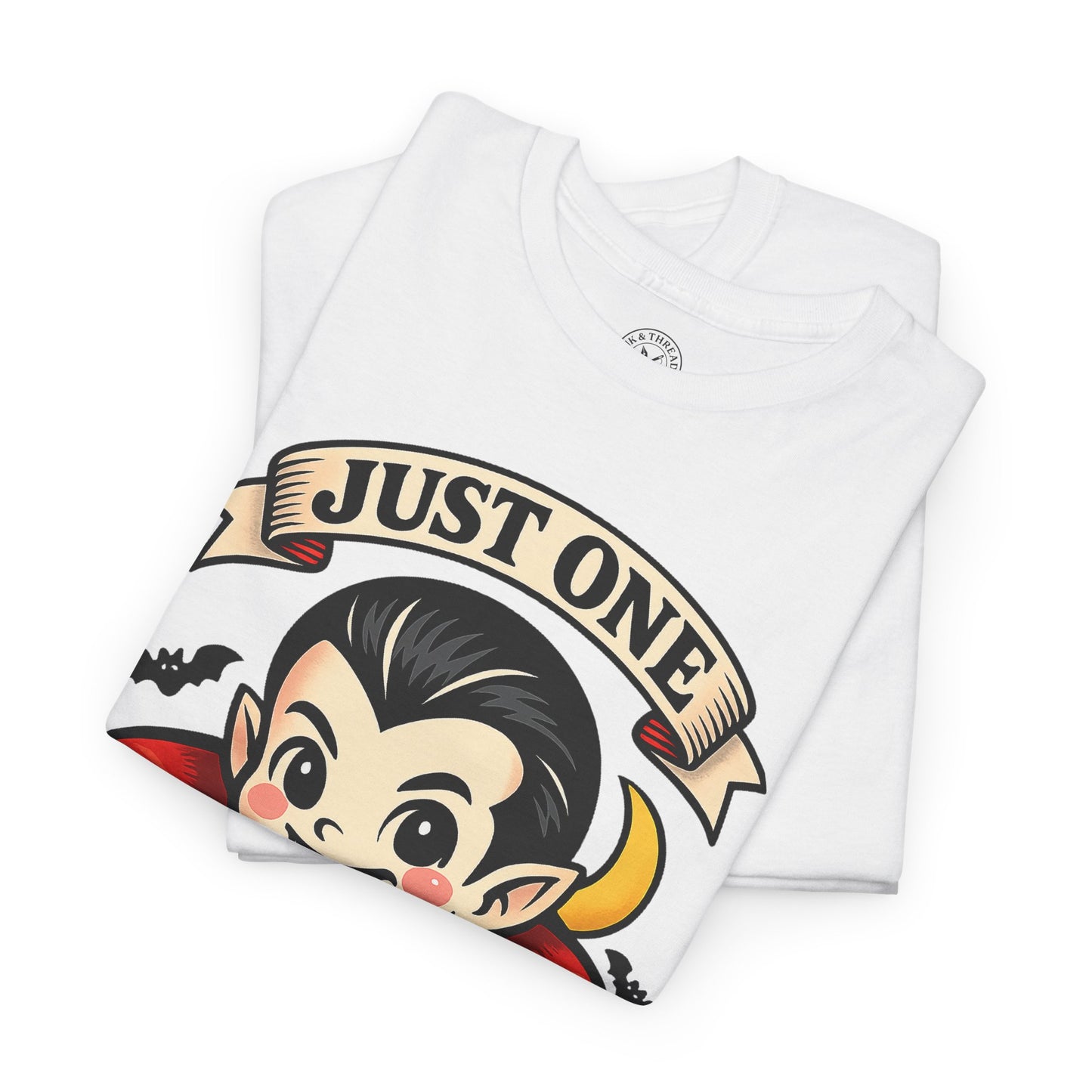 Just One Bite white folded t-shirt showing cute kawaii vampire with fangs and red cape Halloween design