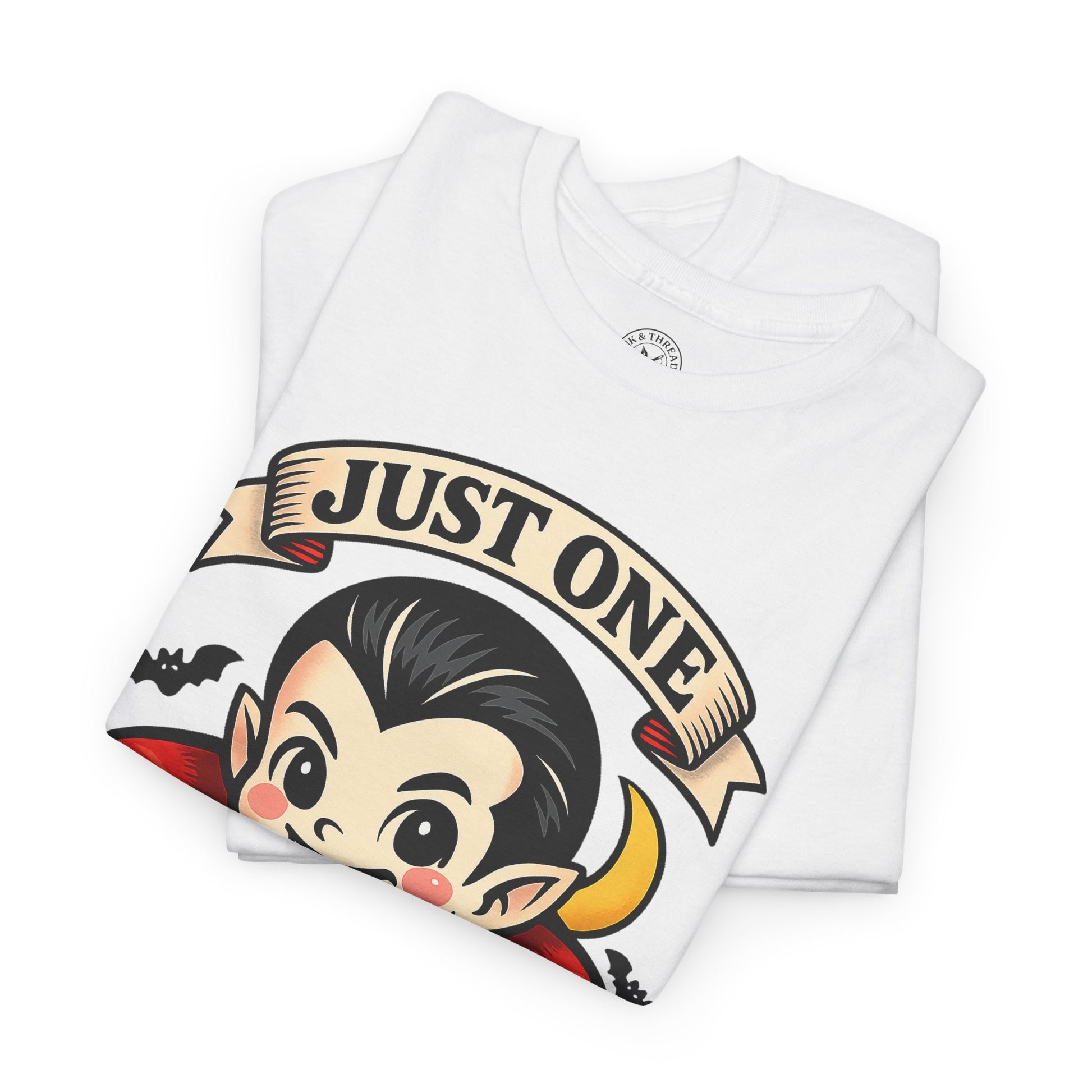 Just One Bite white folded t-shirt showing cute kawaii vampire with fangs and red cape Halloween design