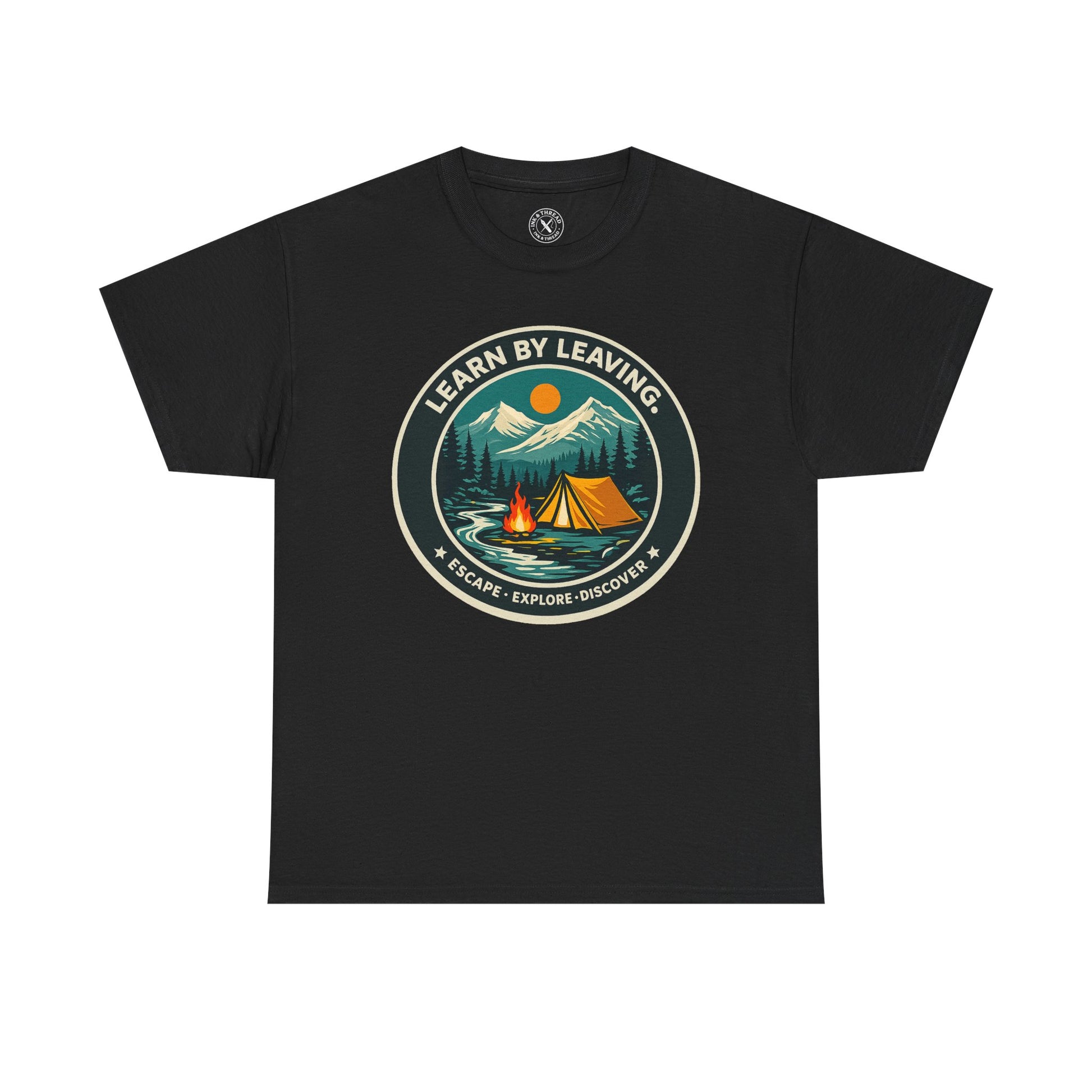 Black unisex t-shirt featuring Learn By Leaving camping circular badge graphic with tent, campfire, mountains and escape explore discover design