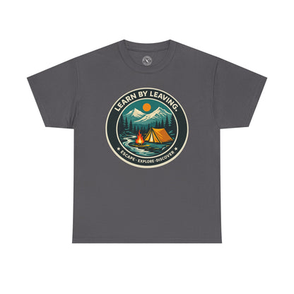 Charcoal grey unisex t-shirt featuring Learn By Leaving camping circular badge graphic with tent, campfire, mountains and escape explore discover design