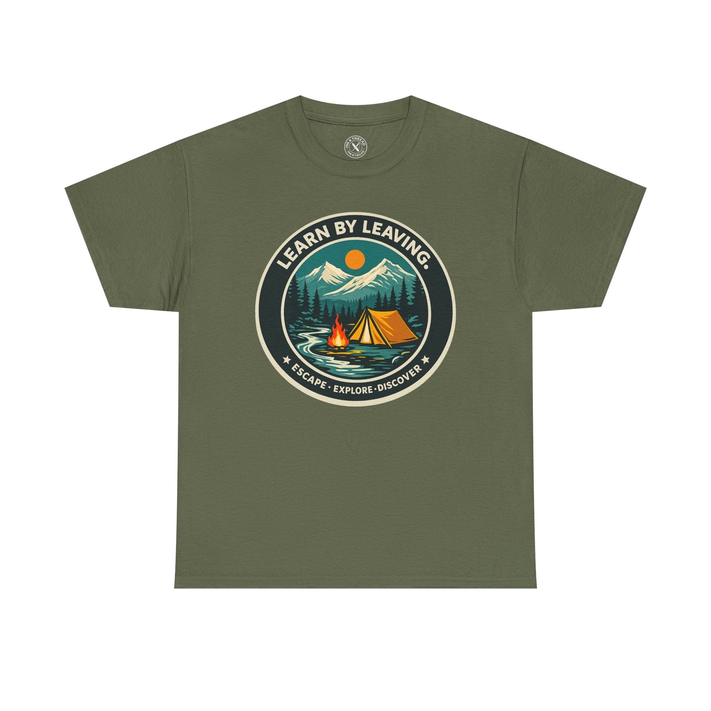 Olive green unisex t-shirt featuring Learn By Leaving camping circular badge graphic with tent, campfire, mountains and escape explore discover design